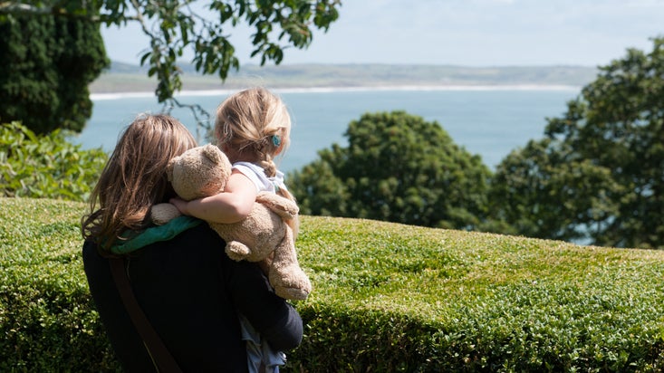 Visitors in the garden at Plas yn Rhiw, Gwynedd, Wales
